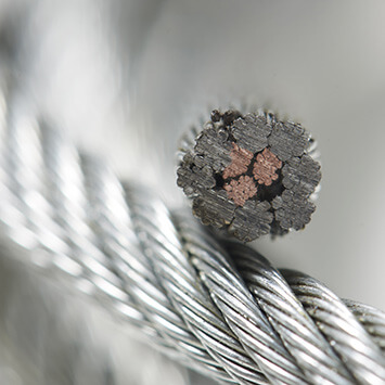 Steel wire rope with electrical conductors